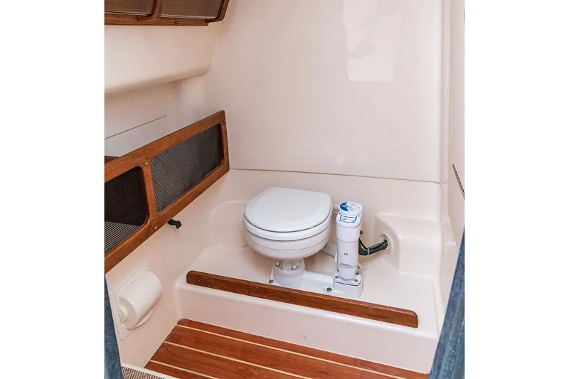 Slide: The Image of Manufacturer Provided Image: 2023 Grady-White 281 Coastal Explorer boat interior bathroom with toilet. - 51