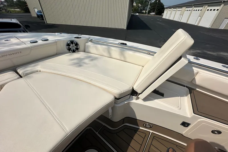 Slide: The Image of 2023 Grady-White 281 Coastal Explorer boat interior with adjustable seating and speaker. - 27