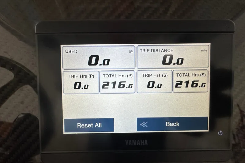 Slide: The Image of Display screen on 2023 Grady-White 281 Coastal Explorer showing trip and fuel data. - 21