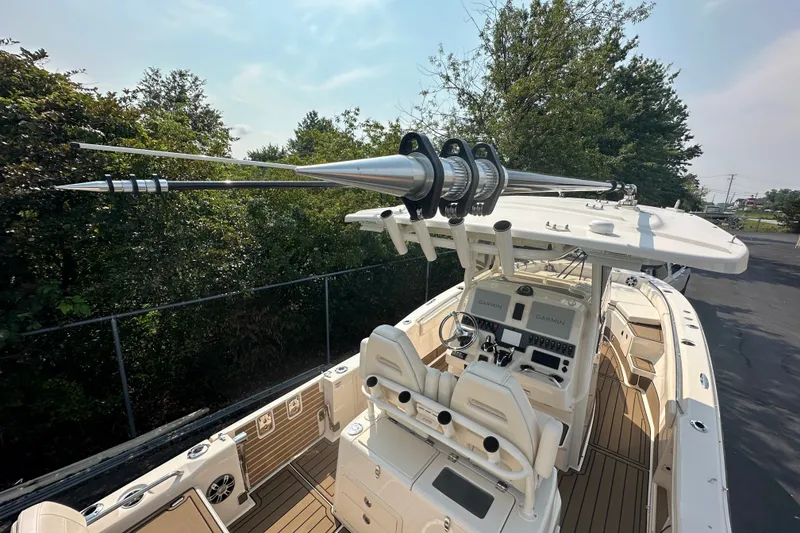 Slide: The Image of 2023 Grady-White 281 Coastal Explorer boat with advanced navigation equipment and sleek design. - 33