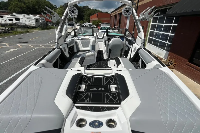 Slide: The Image of 2020 Tigé 23ZX boat interior with sleek seating and modern design features. - 7