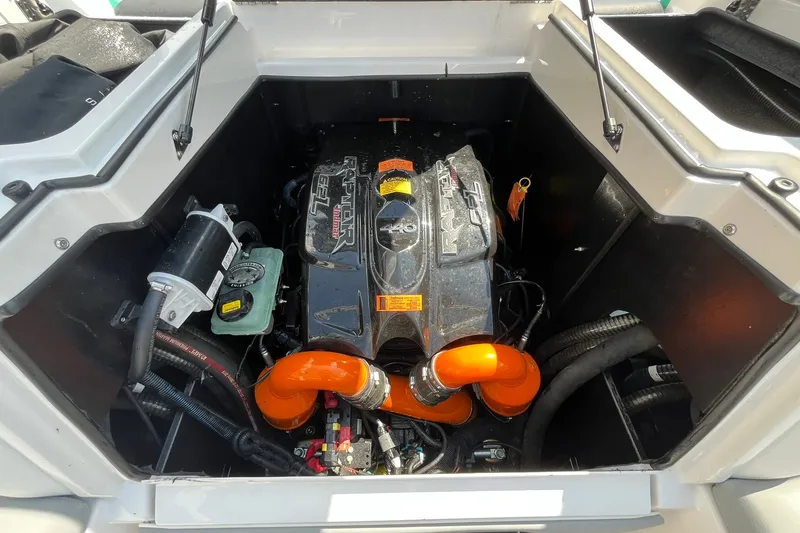 Slide: The Image of Engine compartment of a 2020 Tigé 23ZX boat with Raptor motor. - 12