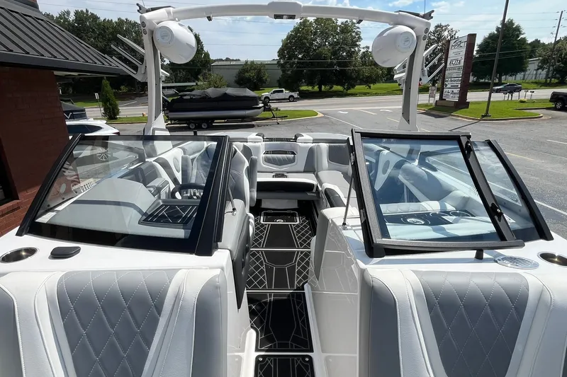 Slide: The Image of 2020 Tigé 23ZX boat interior with luxurious seating and modern design. - 10