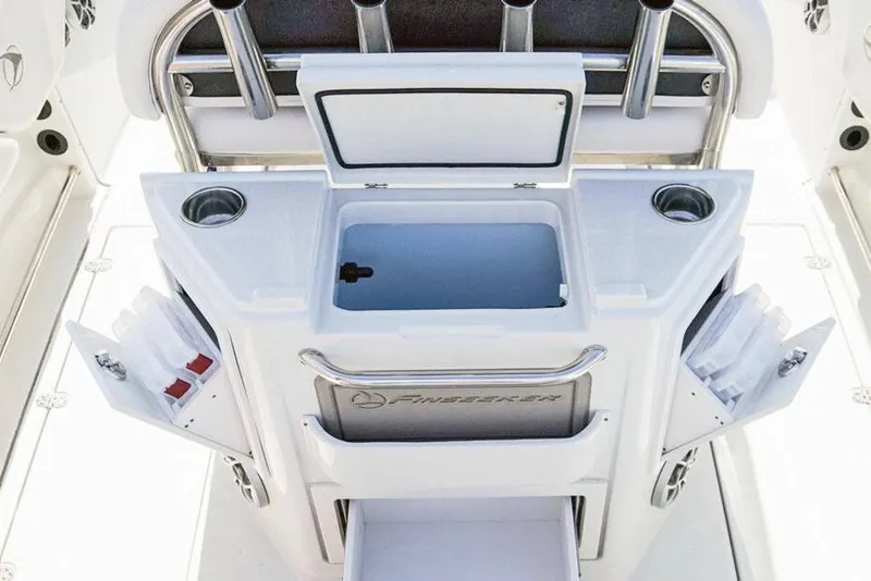 Slide: The Image of Manufacturer Provided Image: 2026 Finseeker 220 CC boat console with storage compartments and cup holders. - 7