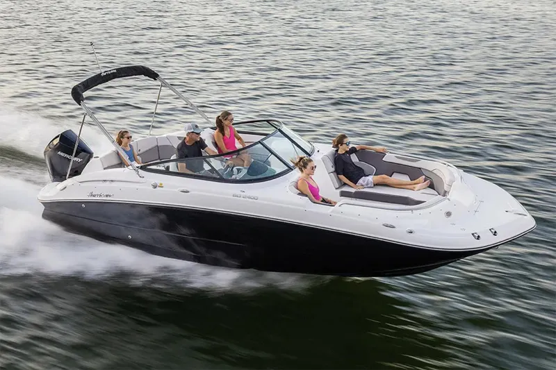 The Image of Manufacturer Provided Image: 2026 Hurricane SunDeck 2400 OB cruising on water with passengers enjoying the ride. - 0