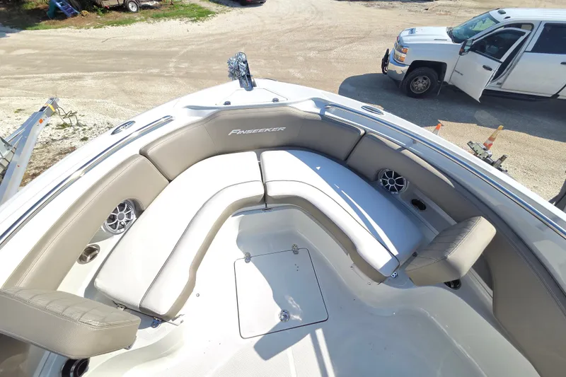 Slide: The Image of 2026 Finseeker 210 CC boat interior with spacious seating and modern design. - 19