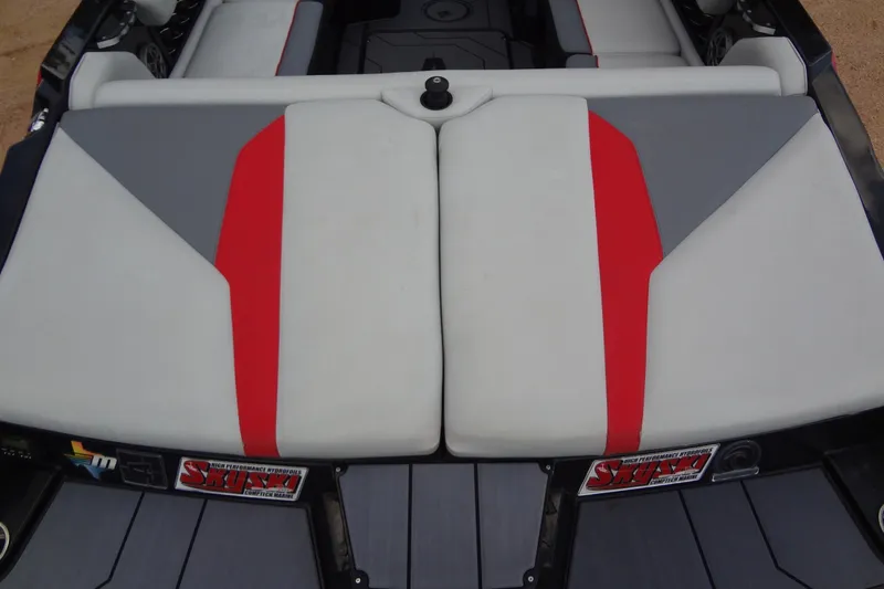 Slide: The Image of 2020 Axis A22 boat interior with gray and red upholstery design. - 10