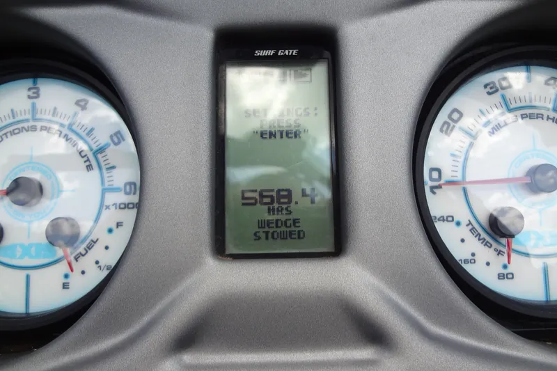 Slide: The Image of Dashboard of 2020 Axis A22 boat showing gauges and digital display. - 27
