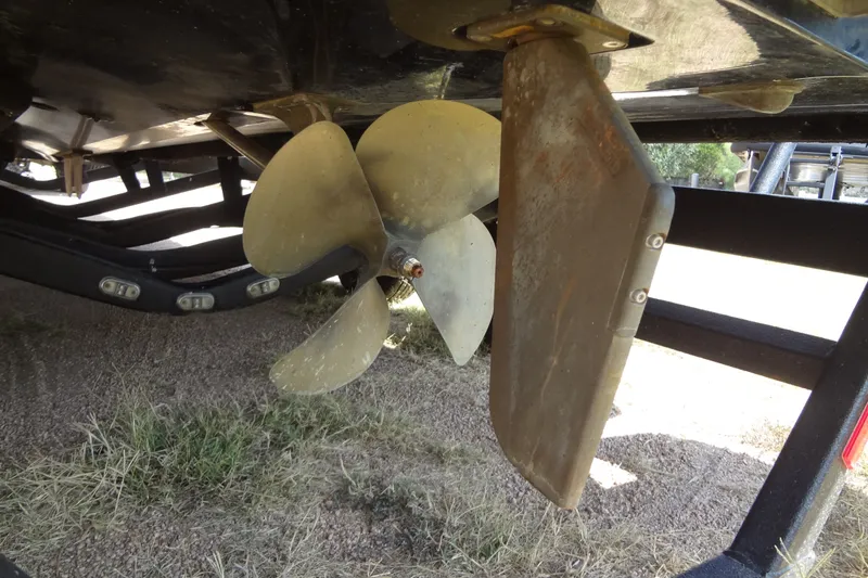 Slide: The Image of Propeller and rudder of a 2020 Axis A22 boat on a trailer. - 41