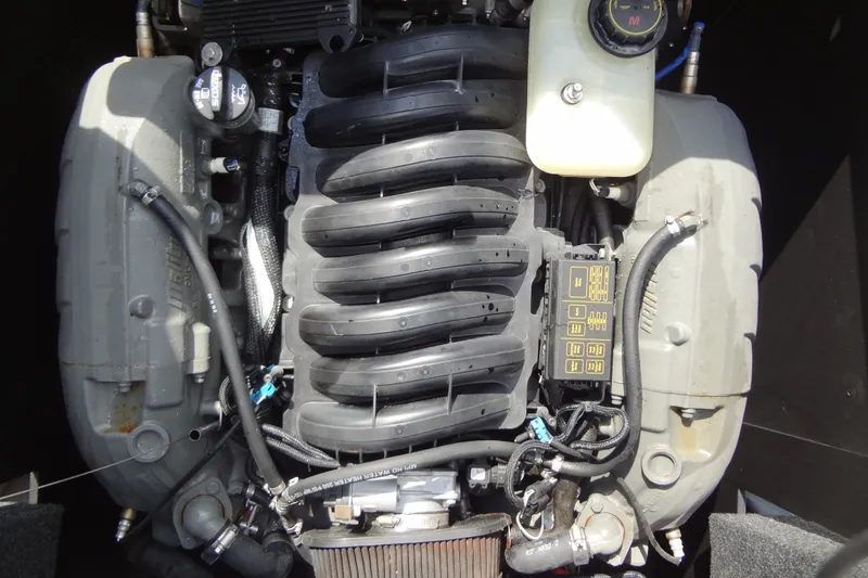 Slide: The Image of 2020 Axis A22 engine close-up, showcasing intricate components and wiring. - 37