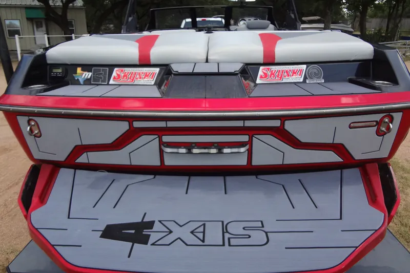 Slide: The Image of 2020 Axis A22 boat rear view with custom graphics and SkySki stickers. - 9