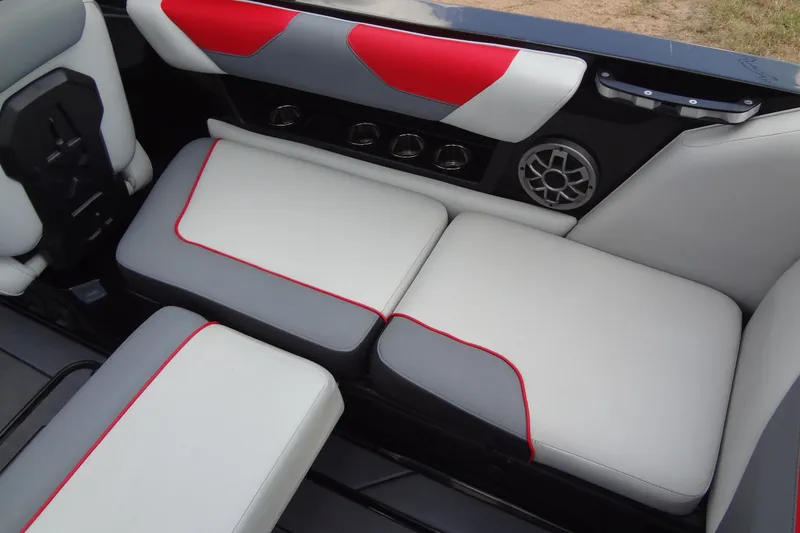 Slide: The Image of 2020 Axis A22 boat interior with stylish seating and speaker system. - 22