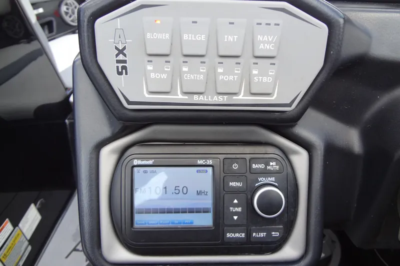 Slide: The Image of Control panel of a 2020 Axis A22 boat with ballast and audio system. - 29