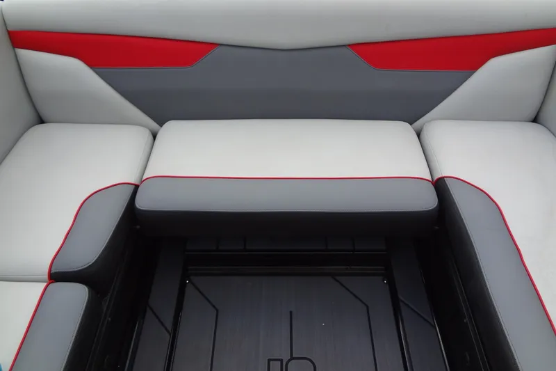 Slide: The Image of 2020 Axis A22 boat interior with gray and red cushioned seating. - 19