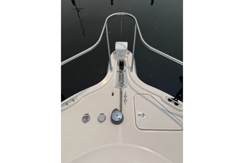 Slide: The Image of Bow view of a 2008 Tiara Yachts 3000 Open, featuring deck fittings and railing. - 10