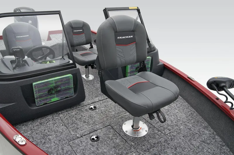 Slide: The Image of Manufacturer Provided Image: 2025 Tracker Pro Guide V-16 WT boat interior with gray seating and modern dashboard. - 27