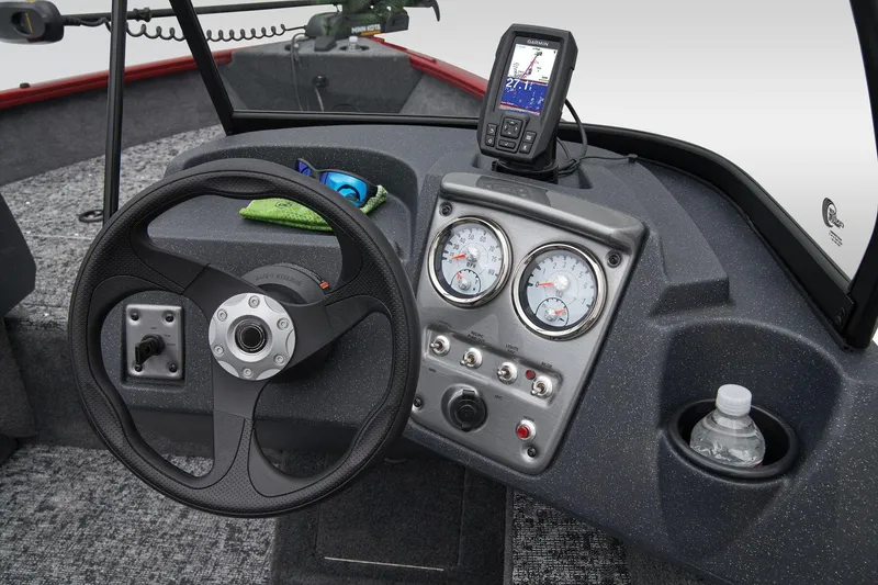 Slide: The Image of Manufacturer Provided Image: 2025 Tracker Pro Guide V-16 WT boat dashboard with steering wheel and gauges. - 31