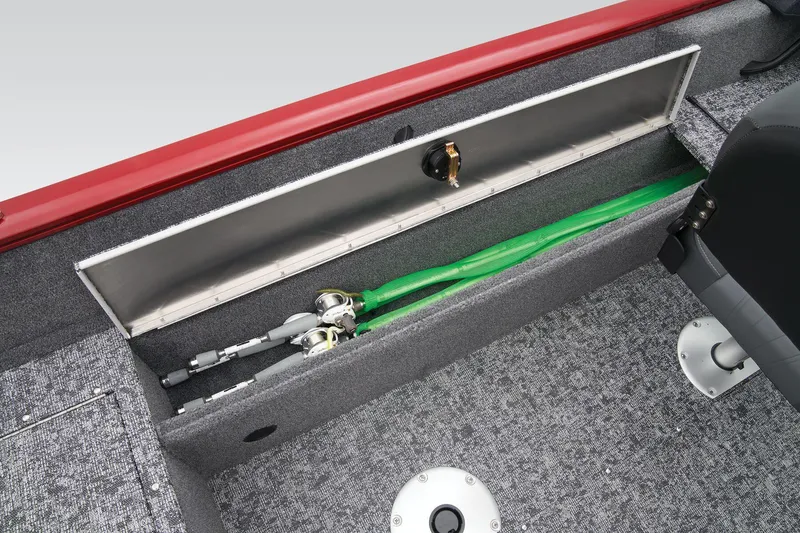 Slide: The Image of Manufacturer Provided Image: 2025 Tracker Pro Guide V-16 WT boat storage compartment with fishing rods and green hose. - 39