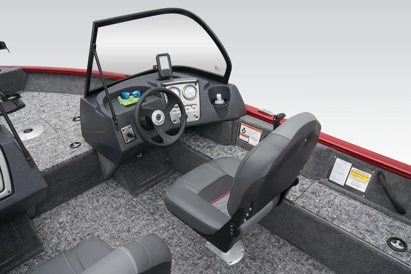 Slide: The Image of Manufacturer Provided Image: 2025 Tracker Pro Guide V-16 WT boat interior with steering console and seating. - 30