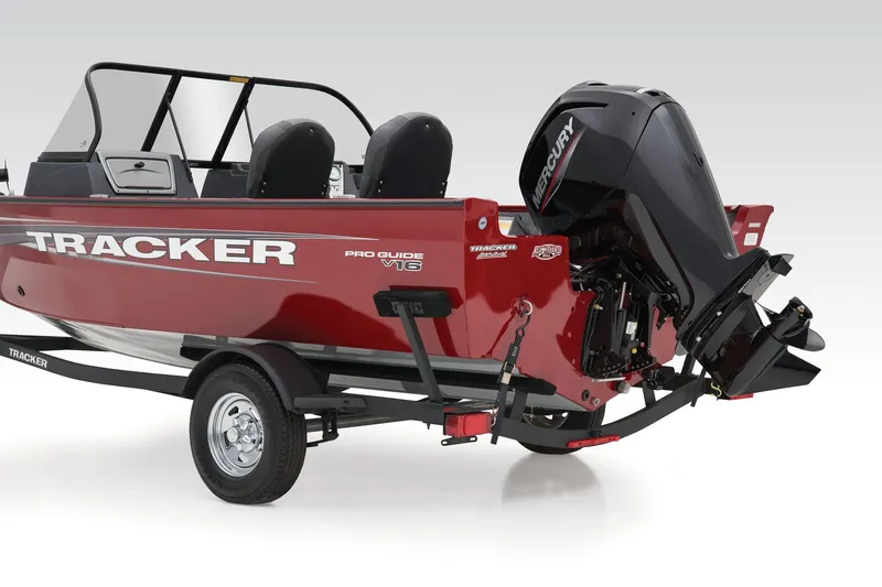 Slide: The Image of Manufacturer Provided Image: 2025 Tracker Pro Guide V-16 WT boat with Mercury engine, red exterior, on trailer. - 46