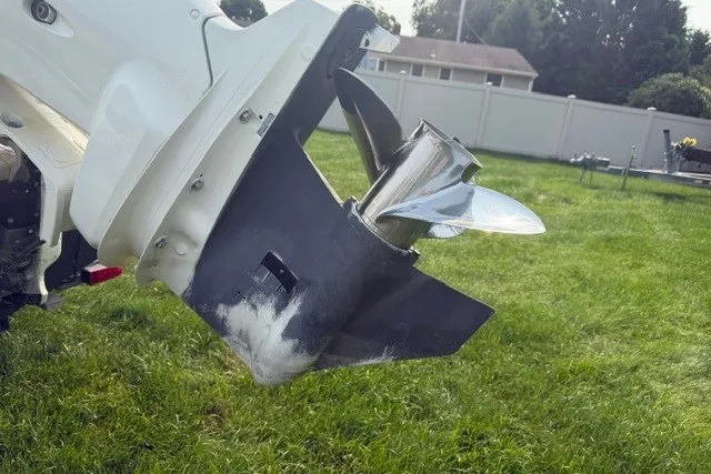 Slide: The Image of Outboard motor propeller of 2021 Bulls Bay 230 Center Console on grass. - 36