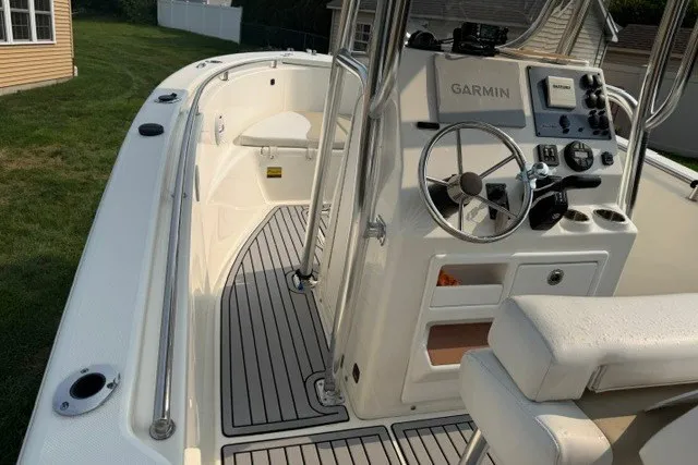 Slide: The Image of 2021 Bulls Bay 230 Center Console boat with Garmin navigation system, sleek deck design. - 25