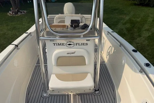 Slide: The Image of 2021 Bulls Bay 230 Center Console boat with "Time Flies" text on the console. - 21
