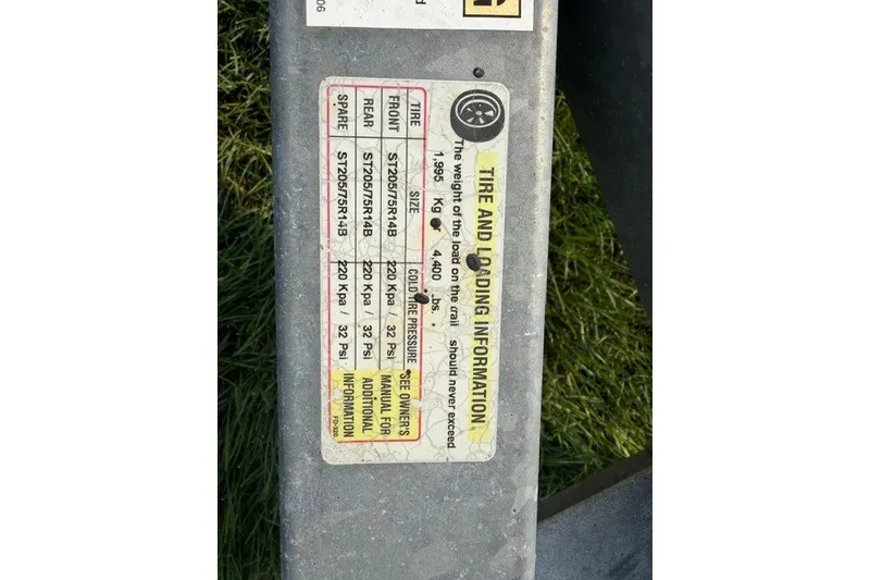 Slide: The Image of Tire and loading information label on Bulls Bay 230 Center Console, 2021 model. - 41