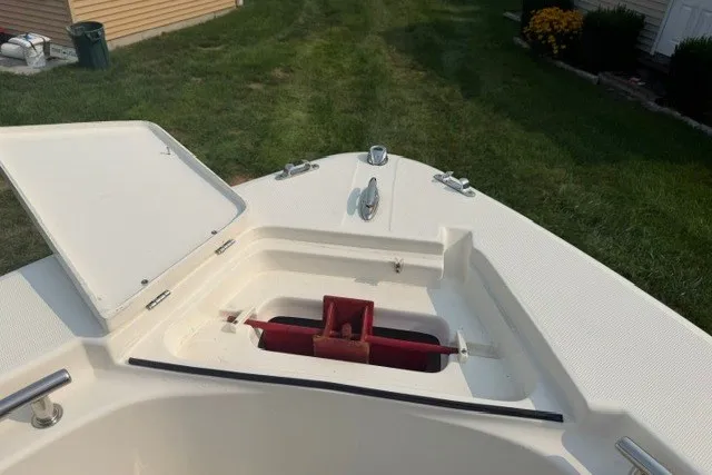 Slide: The Image of 2021 Bulls Bay 230 Center Console boat bow with open storage compartment. - 20