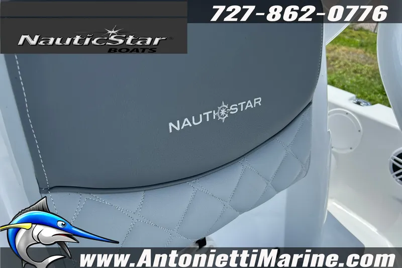 Slide: The Image of 2024 NauticStar 214 Bay boat seat with logo, contact info, and website details. - 10