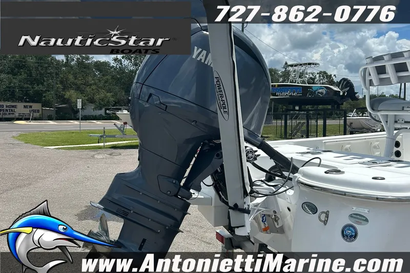 Slide: The Image of 2024 NauticStar 214 Bay boat with Yamaha engine at Antonietti Marine. - 5