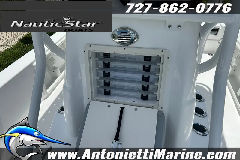 Slide: The Image of 2024 NauticStar 214 Bay boat with tackle storage, featuring Antonietti Marine branding. - 19