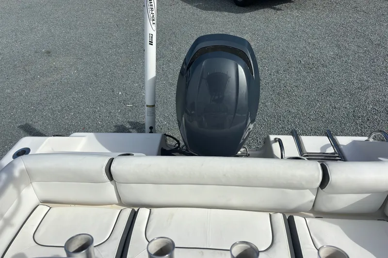 Slide: The Image of 2015 Tidewater 210 LXF boat with outboard motor and seating, viewed from above. - 13