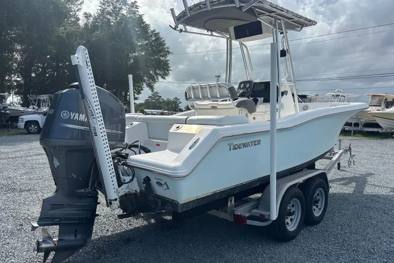 Slide: The Image of 2015 Tidewater 210 LXF boat on trailer with Yamaha outboard motor. - 3