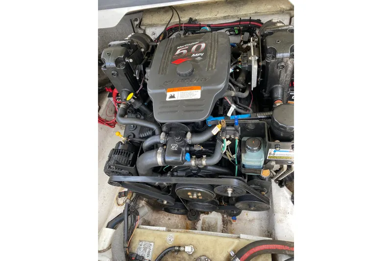 Slide: The Image of Engine of 2008 Four Winns H220 boat, featuring a 5.0 MPI Mercury motor. - 40