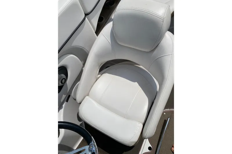 Slide: The Image of White leather seat in 2008 Four Winns H220 boat, showcasing luxury and comfort. - 31