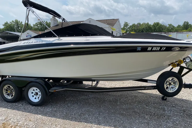 Slide: The Image of 2008 Four Winns H220 boat on trailer, black and white design, - 8