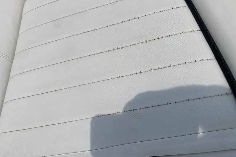 Slide: The Image of Close-up of 2008 Four Winns H220 boat seat with visible stitching. - 71