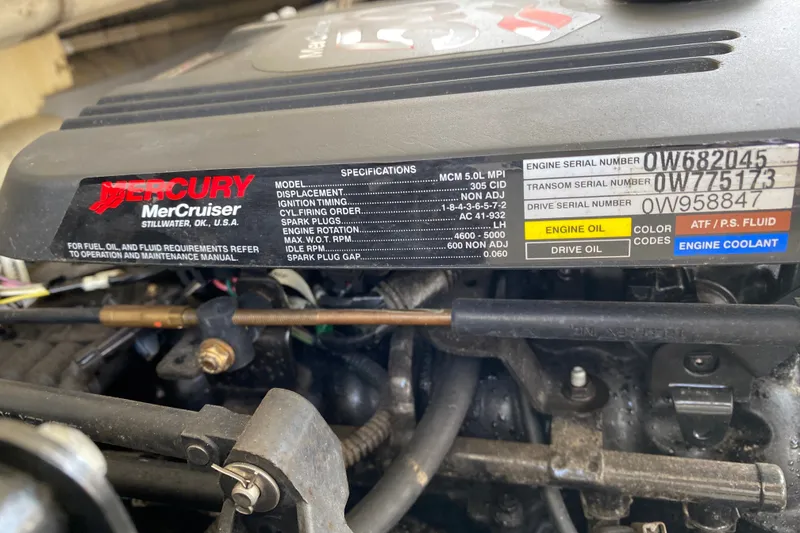 Slide: The Image of Mercury MerCruiser engine label on a 2008 Four Winns H220 boat, showing specifications and serial numbers. - 42