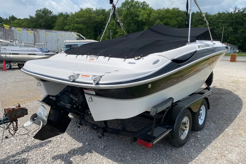 Slide: The Image of 2008 Four Winns H220 boat on trailer with a very good quality cover. - 10