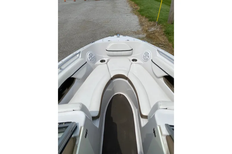 Slide: The Image of 2008 Four Winns H220 boat interior with white seating and cup holders. - 72