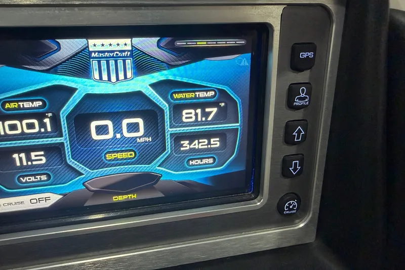 Slide: The Image of Dashboard of a 2017 MasterCraft X46 boat displaying temperature, speed, and GPS controls. - 12