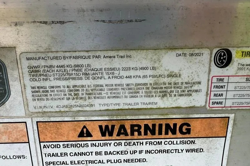 Slide: The Image of Label on Sea Hunt Gamefish 27FS trailer, manufactured by Amera Trail Inc, with safety warnings. - 68