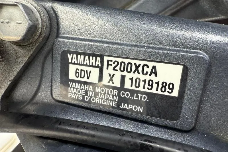 Slide: The Image of Yamaha F200XCA engine label on 2022 Sea Hunt Gamefish 27FS, made in Japan. - 66