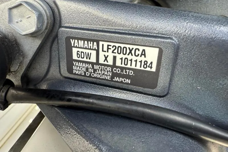 Slide: The Image of Yamaha LF200XCA engine label on 2022 Sea Hunt Gamefish 27FS, made in Japan. - 67