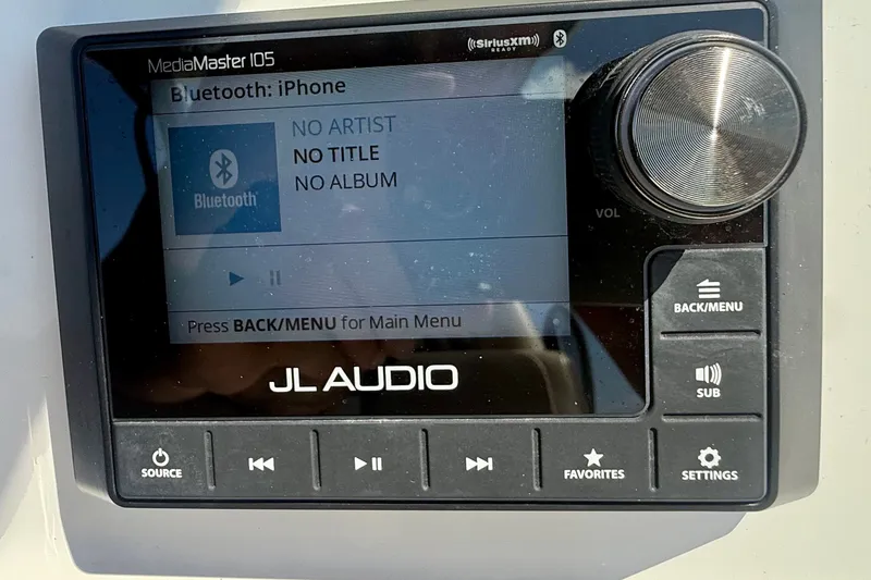 Slide: The Image of JL Audio MediaMaster 105 display on 2019 Tidewater 320 CC Adventure boat, showing Bluetooth connection. - 6