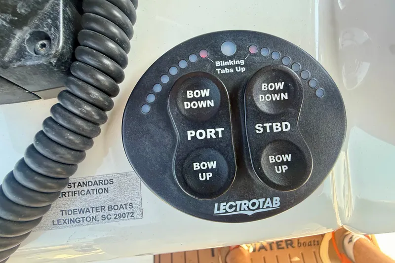 Slide: The Image of Control panel of a 2019 Tidewater 320 CC Adventure boat with Lectrotab trim tabs. - 4