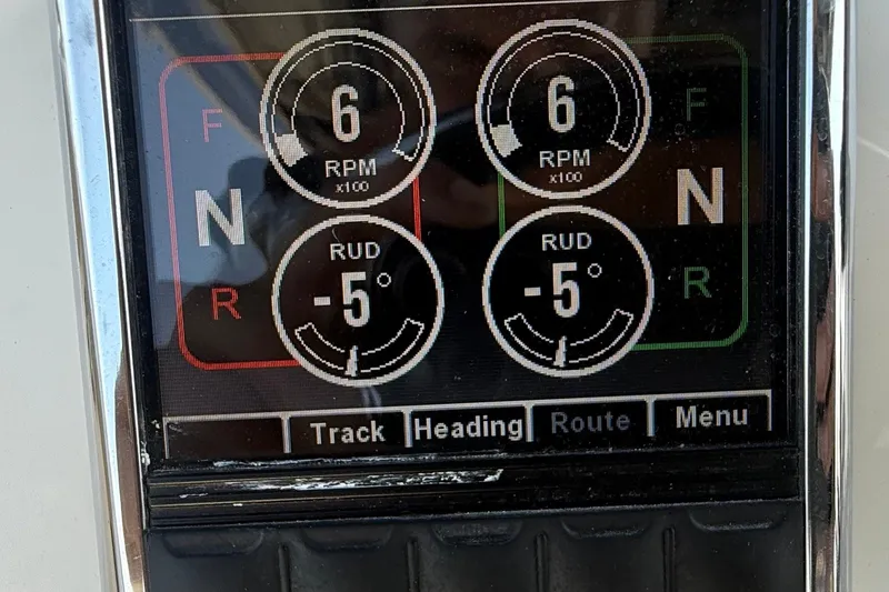 Slide: The Image of Digital display showing RPM and rudder angle on a 2019 Tidewater 320 CC Adventure. - 8