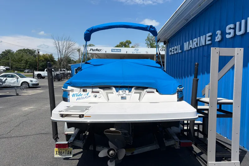 Slide: The Image of 2016 Regal 1900 ESX Bowrider with blue cover at Cecil Marine. - 6