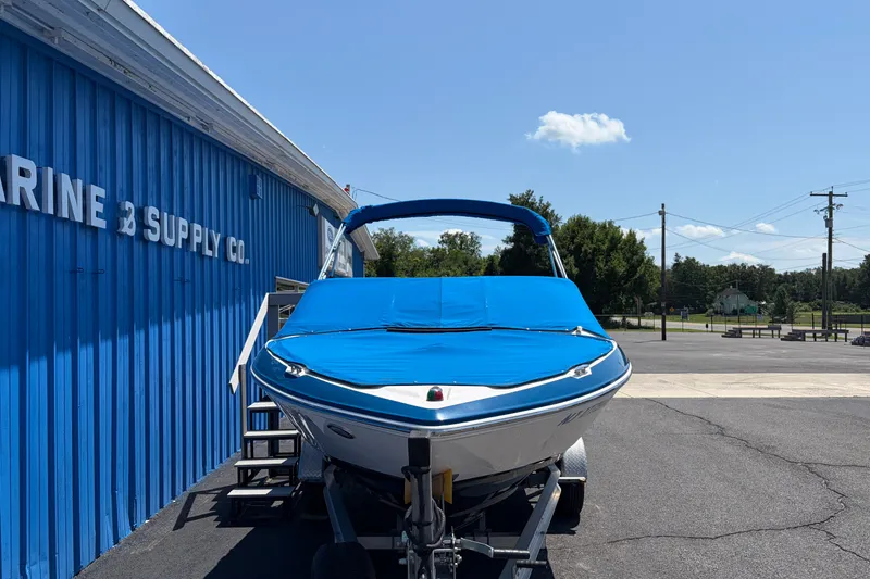Slide: The Image of 2016 Regal 1900 ESX Bowrider with blue cover at Marine Supply Co. - 4